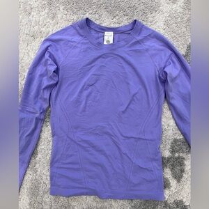 Athleta Momentum Seamless Tee in a purple color.